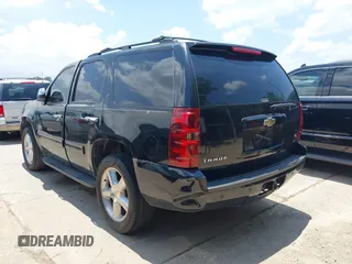2011 Chevrolet Tahoe LT with VIN 1GNSCBE01BR389984, listed as a IAAI auction lot 42673033 with 289,294 mi miles and . Bid and sale history available at DreamBid. Image 3.