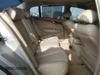 2003 Infiniti Q45 z VIN JNKBF01A03M101890, wystawiony jako Copart lot #86930994 z przebiegiem 158 134 mil mil oraz Szkody całkowita. Historia ofert i sprzedaży dostępna na DreamBid. Obrazek 11.