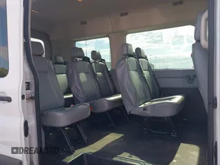 2018 Ford Transit Passenger XL z VIN 1FMZK1CM1JKA17249, wystawiony jako IAAI lot #42143530 z przebiegiem 218 425 mil mil oraz . Historia ofert i sprzedaży dostępna na DreamBid. Obrazek 8.