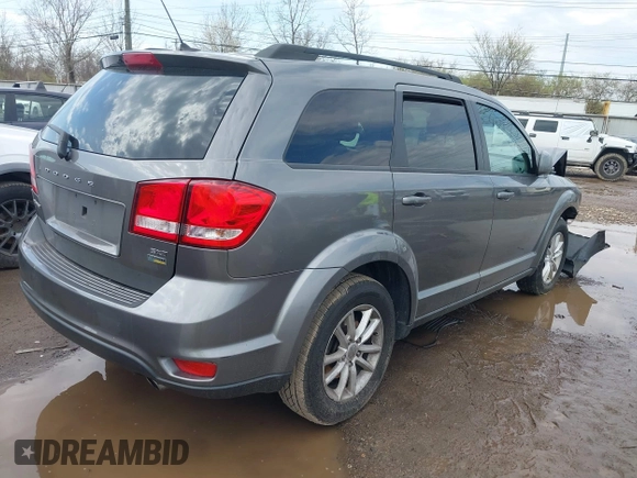 2013 Dodge Journey SXT with VIN 3C4PDCBG6DT506486, listed as a IAAI auction lot 41877271 with 196,597 mi miles and . Bid and sale history available at carsss.com. Image 4.