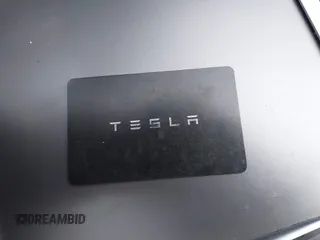 2021 Tesla Model Y Long Range with VIN 5YJYGDEE6MF209034, listed as a IAAI auction lot 41896238 with 53,401 mi miles. Bid and sale history available at carsss.com. Image 11.