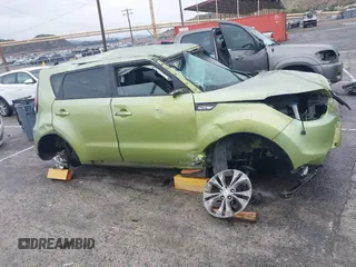2014 Kia Soul + with VIN KNDJP3A55E7039225, listed as a IAAI auction lot 41770460 with 91,536 mi miles. Bid and sale history available at carsss.com. Image 12.
