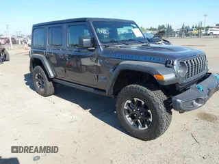 2025 Jeep Wrangler Rubicon z VIN 1C4RJXR63SW572071, wystawiony jako IAAI lot #42203727 z przebiegiem 1 080 mil mil oraz . Historia ofert i sprzedaży dostępna na DreamBid. Obrazek 1.