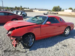 2002 Ford Thunderbird Hardtop Premium z VIN 1FAHP60A32Y109413, wystawiony jako Copart lot #70139244 z przebiegiem 123 230 mil mil oraz Szkoda całkowita • Salvage title. Historia ofert i sprzedaży dostępna na DreamBid. Obrazek 1.