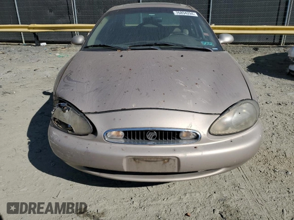 1999 Mercury Sable LS z VIN 1MEFM53S7XG602788, wystawiony jako Copart lot #76894294 z przebiegiem 186 315 mil mil oraz Szkoda całkowita • Salvage title. Historia ofert i sprzedaży dostępna na DreamBid. Obrazek 5.