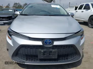2022 Toyota Corolla Hybrid LE with VIN JTDEAMDE6NJ056705, listed as a IAAI auction lot 42032119 with 197,030 mi miles. Bid and sale history available at carsss.com. Image 12.
