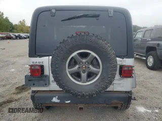 2004 Jeep Wrangler X with VIN 1J4FA39S74P724420, listed as a Copart auction lot 71839944 with 135,742 mi miles and Clean Title. Bid and sale history available at carsss.com. Image 6.