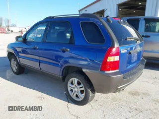 2005 Kia Sportage LX with VIN KNDJF723157097517, listed as a IAAI auction lot 41485759 with 207,294 mi miles and . Bid and sale history available at carsss.com. Image 3.
