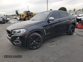 2017 BMW X6 sDrive35i with VIN 5UXKU0C36H0G69163, listed as a Copart auction lot 87044784 with 99,452 mi miles and Salvage Title. Bid and sale history available at carsss.com. Image 1.