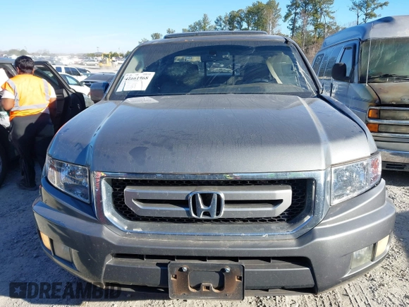 2010 Honda Ridgeline RTL with VIN 5FPYK1F52AB004678, listed as a IAAI auction lot 41661968 with 169,021 mi miles. Bid and sale history available at carsss.com. Image 12.