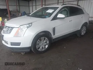 2014 Cadillac SRX z VIN 3GYFNAE32ES580480, wystawiony jako IAAI lot #42170765 z przebiegiem 148 245 mil mil oraz . Historia ofert i sprzedaży dostępna na DreamBid. Obrazek 2.