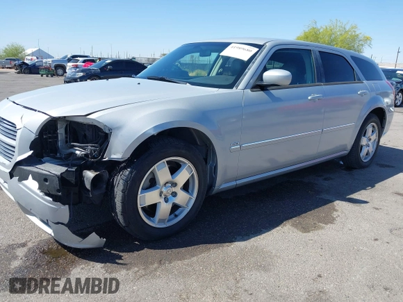 2005 Dodge Magnum z VIN 2D8GZ58235H576127, wystawiony jako IAAI lot #41989680 z przebiegiem 136 488 mil mil oraz . Historia ofert i sprzedaży dostępna na DreamBid. Obrazek 18.