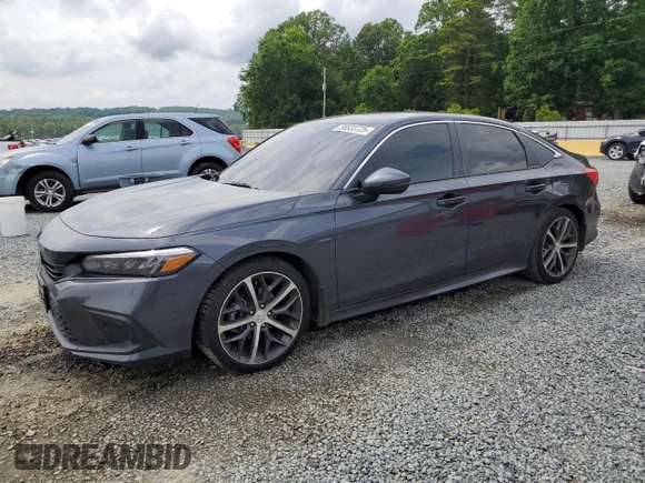2024 Honda Civic Touring z VIN 2HGFE1F96RH324748, wystawiony jako Copart lot #58833725 z przebiegiem Nie podano mil oraz Szkoda całkowita • Salvage title. Historia ofert i sprzedaży dostępna na DreamBid. Obrazek 1.