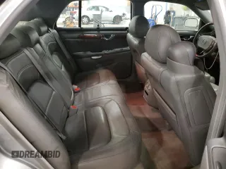 2005 Cadillac DeVille DHS z VIN 1G6KE54Y35U254893, wystawiony jako Copart lot #60356815 z przebiegiem 177 174 mil mil oraz Czysty tytuł • Clean title. Historia ofert i sprzedaży dostępna na DreamBid. Obrazek 10.
