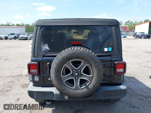 2019 Jeep Wrangler Sport S with VIN 1C4GJXAG2KW664395, listed as a IAAI auction lot 42683888 with 72,742 mi miles and . Bid and sale history available at DreamBid. Image 16.