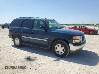 2005 GMC Yukon SLT with VIN 1GKEK13T15J239462, listed as a Copart auction lot 52131435 with 164,696 mi miles and Salvage Title. Bid and sale history available at carsss.com. Image 4.