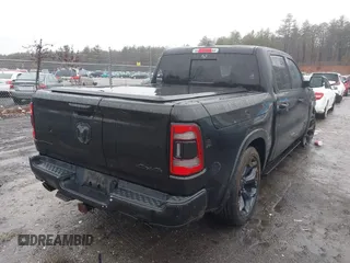 2021 Ram 1500 Limited with VIN 1C6SRFHT3MN500590, listed as a IAAI auction lot 41117602 with 81,875 mi miles and . Bid and sale history available at DreamBid. Image 4.