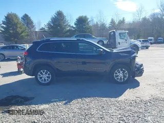 2015 Jeep Cherokee Latitude with VIN 1C4PJMCB3FW652553, listed as a IAAI auction lot 41881238 with 161,944 mi miles and . Bid and sale history available at DreamBid. Image 13.