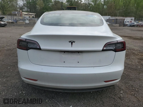 2018 Tesla Model 3 Long Range Battery with VIN 5YJ3E1EAXJF165000, listed as a Copart auction lot 53806195 with 140,448 mi miles and Clean Title. Bid and sale history available at DreamBid. Image 6.