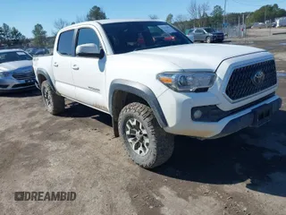 2018 Toyota Tacoma SR with VIN 3TMCZ5AN5JM171240, listed as a IAAI auction lot 41532601 with 157,840 mi miles. Bid and sale history available at carsss.com. Image 1.