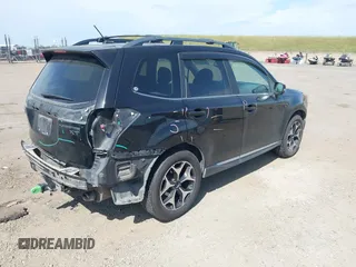 2015 Subaru Forester XT Touring with VIN JF2SJGUC5FH822632, listed as a IAAI auction lot 42032965 with 118,111 mi miles and . Bid and sale history available at DreamBid. Image 4.