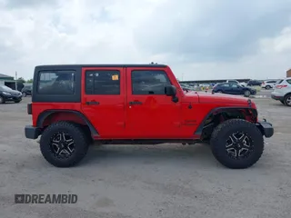 2015 Jeep Wrangler Unlimited Sport with VIN 1C4HJWDGXFL575918, listed as a IAAI auction lot 42349494 with Not provided miles and . Bid and sale history available at DreamBid. Image 13.