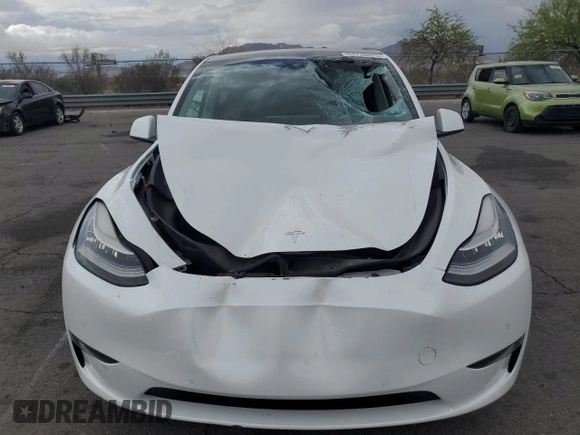 2021 Tesla Model Y Long Range z VIN 5YJYGDEE9MF200411, wystawiony jako Copart lot #53738075 z przebiegiem 97 546 mil mil oraz Szkoda całkowita • Salvage title. Historia ofert i sprzedaży dostępna na DreamBid. Obrazek 5.