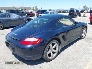 2007 Porsche 718 Cayman z VIN WP0AA29837U762585, wystawiony jako IAAI lot #42201028 z przebiegiem 58 563 mil mil oraz . Historia ofert i sprzedaży dostępna na DreamBid. Obrazek 4.