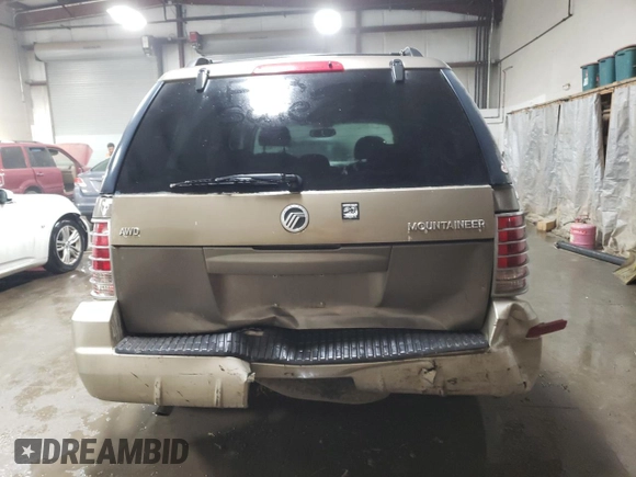 2004 Mercury Mountaineer Convenience z VIN 4M2ZU86K74UJ02231, wystawiony jako Copart lot #76743034 z przebiegiem 201 855 mil mil oraz Szkoda całkowita • Salvage title. Historia ofert i sprzedaży dostępna na DreamBid. Obrazek 6.