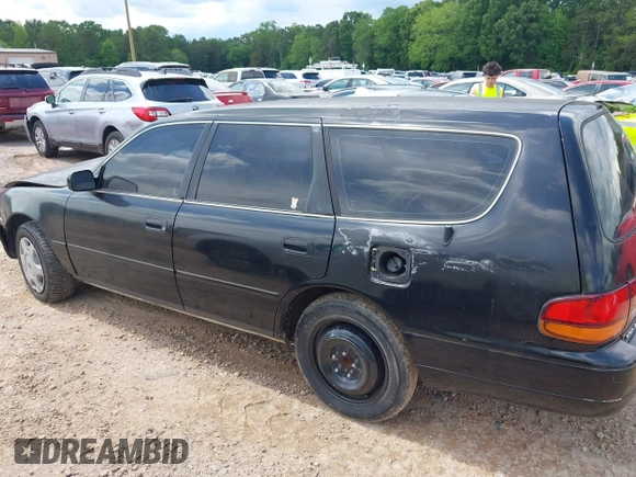1996 Toyota Camry LE z VIN 4T1EF12K9TU117514, wystawiony jako IAAI lot #42241880 z przebiegiem 192 764 mil mil oraz . Historia ofert i sprzedaży dostępna na DreamBid. Obrazek 14.