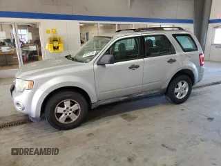 2010 Ford Escape XLS with VIN 1FMCU9C78AKA44179, listed as a Copart auction lot 80518154 with 175,149 mi miles and Salvage title. Bid and sale history available at DreamBid. Image 1.