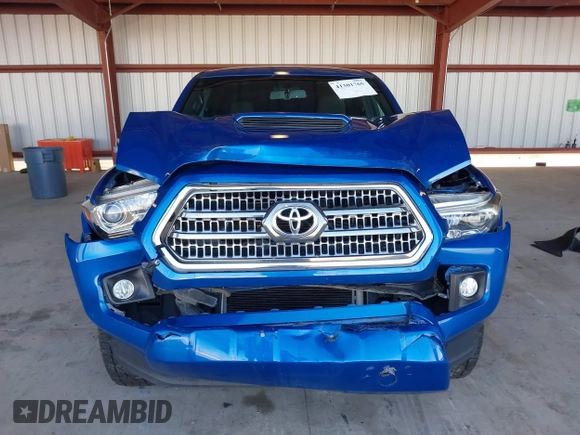 2017 Toyota Tacoma SR5 with VIN 3TMBZ5DN1HM009204, listed as a IAAI auction lot 41301765 with 129,923 mi miles and . Bid and sale history available at DreamBid. Image 12.