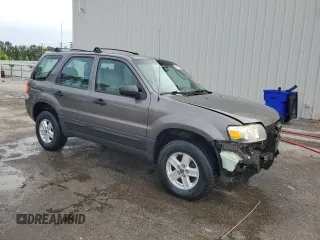 2006 Ford Escape XLS with VIN 1FMYU02Z66KA18952, listed as a Copart auction lot 60472305 with 221,258 mi miles and Salvage title. Bid and sale history available at DreamBid. Image 4.