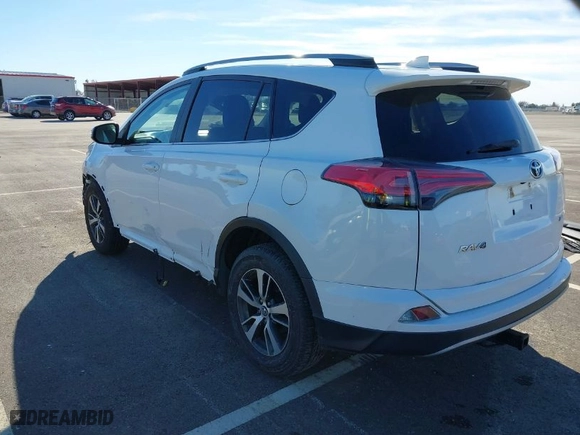 2018 Toyota RAV4 XLE with VIN 2T3WFREV8JW425027, listed as a IAAI auction lot 41272635 with 79,445 mi miles. Bid and sale history available at carsss.com. Image 3.