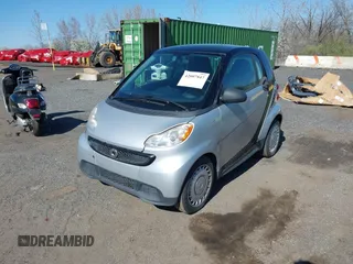 2015 Smart fortwo Passion with VIN WMEEJ3BA6FK793068, listed as a IAAI auction lot 42007847 with 42,313 mi miles. Bid and sale history available at carsss.com. Image 2.