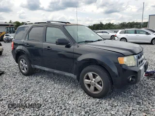 2010 Ford Escape Limited with VIN 1FMCU0EG2AKD40114, listed as a Copart auction lot 63455025 with 120,112 mi miles and Salvage title. Bid and sale history available at DreamBid. Image 4.