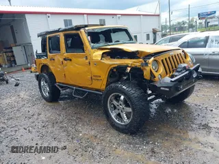 2014 Jeep Wrangler Unlimited Sport with VIN 1C4BJWDG2EL218625, listed as a IAAI auction lot 42473719 with 116,700 mi miles and . Bid and sale history available at DreamBid. Image 1.