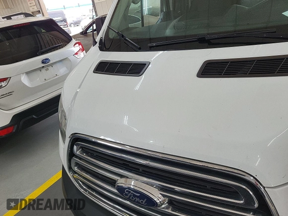 2017 Ford Transit z VIN 1FTYE1ZM7HKA10220, wystawiony jako IAAI lot #42905382 z przebiegiem 143 262 mil mil oraz . Historia ofert i sprzedaży dostępna na DreamBid. Obrazek 8.
