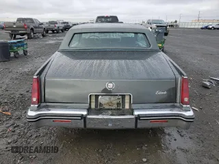 1984 Cadillac Eldorado z VIN 1G6AL5781EE619594, wystawiony jako Copart lot #80918934 z przebiegiem 47 529 mil mil oraz Szkody całkowita. Historia ofert i sprzedaży dostępna na DreamBid. Obrazek 6.