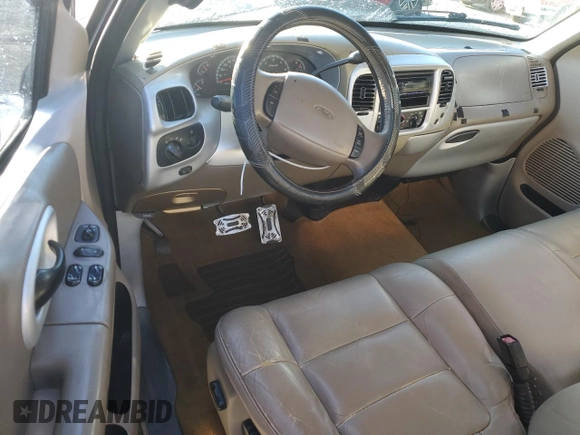 2002 Ford F-150 XL with VIN 1FTRX17L72NA39909, listed as a Copart auction lot 76376994 with 175,926 mi miles and Salvage title. Bid and sale history available at DreamBid. Image 8.
