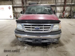 2003 Ford F-150 XL z VIN 2FTRF18W93CB06996, wystawiony jako Copart lot #42758725 z przebiegiem 142 428 mil mil oraz Szkoda całkowita • Salvage title. Historia ofert i sprzedaży dostępna na DreamBid. Obrazek 5.