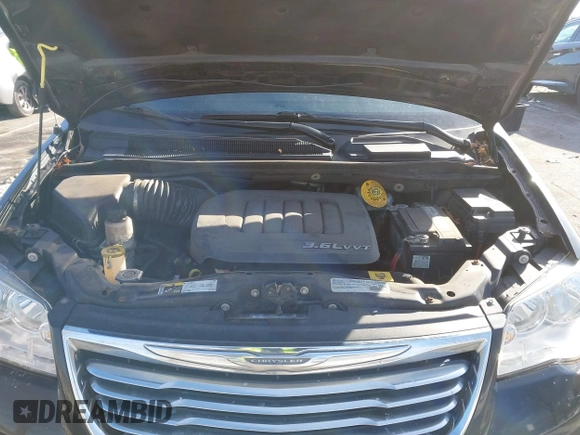 2016 Chrysler Town & Country Touring with VIN 2C4RC1BG7GR231704, listed as a IAAI auction lot 41306140 with 165,890 mi miles. Bid and sale history available at carsss.com. Image 10.