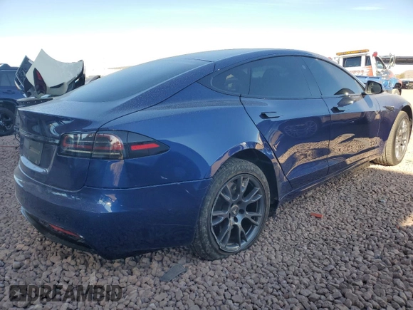 2023 Tesla Model S with VIN 5YJSA1E57PF498760, listed as a Copart auction lot 88494905 with 39,521 mi miles and Salvage title. Bid and sale history available at DreamBid. Image 3.