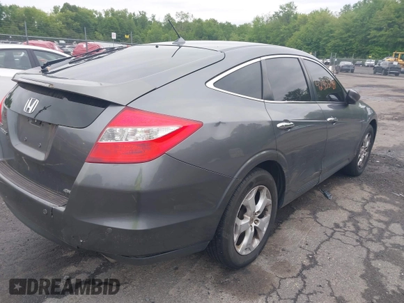 2010 Honda Crosstour EX-L z VIN 5J6TF2H55AL008306, wystawiony jako IAAI lot #42353784 z przebiegiem 209 410 mil mil oraz . Historia ofert i sprzedaży dostępna na DreamBid. Obrazek 4.