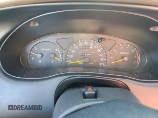 1997 Ford Thunderbird LX with VIN 1FALP62W0VH150654, listed as a Copart auction lot 86274524 with 119,203 mi miles and Salvage Title. Bid and sale history available at DreamBid. Image 9.