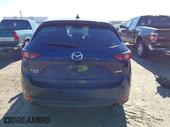 2019 Mazda CX-5 Grand Touring with VIN JM3KFBDM2K1685168, listed as a IAAI auction lot 41323598 with 88,429 mi miles. Bid and sale history available at carsss.com. Image 16.