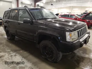 1997 Jeep Grand Cherokee Laredo с VIN 1J4GZ58S3VC508180, выставлен на аукционе Copart как лот 54856525 с пробегом 214 845 миль миль и На запчасти • Non repairable. История ставок и продаж доступна на DreamBid. Изображение 4.