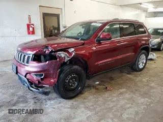 2021 Jeep Grand Cherokee Laredo E with VIN 1C4RJFAG0MC552959, listed as a Copart auction lot 62403245 with 103,019 mi miles and Salvage title. Bid and sale history available at DreamBid. Image 1.