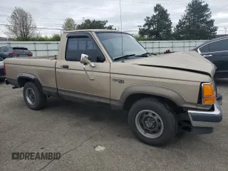 1990 Ford Ranger XLT with VIN 1FTCR10X7LUB23989, listed as a Copart auction lot 53132845 with 133,387 mi miles and Salvage Title. Bid and sale history available at carsss.com. Image 4.