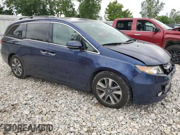 2016 Honda Odyssey Touring Elite with VIN 5FNRL5H98GB004677, listed as a Copart auction lot 59982165 with 119,341 mi miles and Clean title. Bid and sale history available at DreamBid. Image 4.